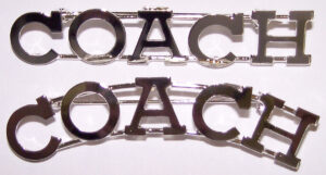COACH metal pin