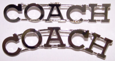 COACH metal pin